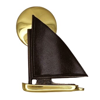 Sailboat and sun (or moon) door knocker at Lowe’s.