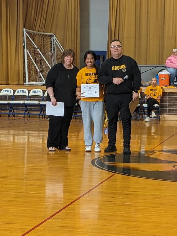 Ariel Alamo receives a certificate of excellence. CANDI JONETH/Boothbay Register