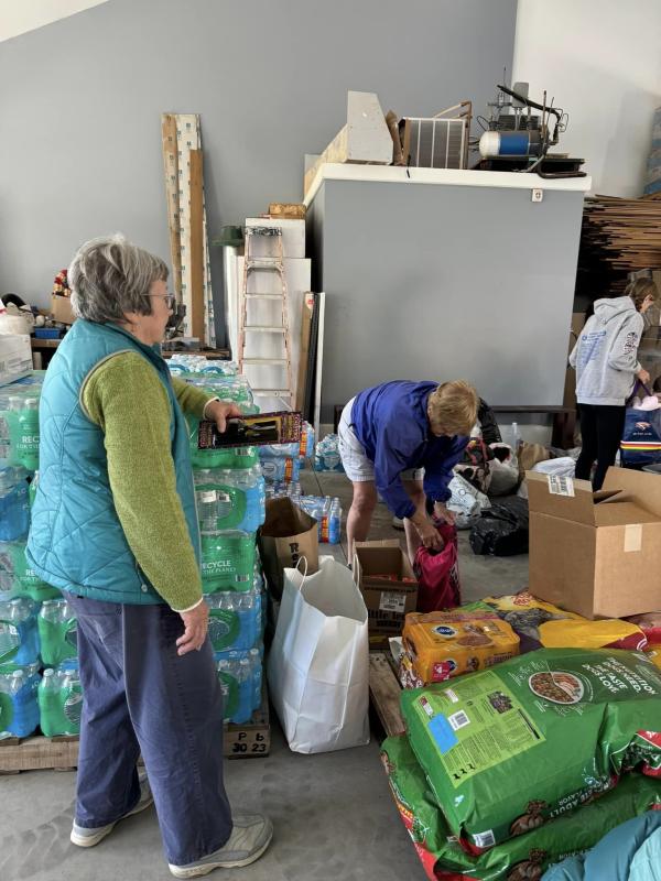 Volunteers get items ready to load into a truck bound for North Carolina to help hurricane victims. Courtesy of Jen Mitchell Packing up