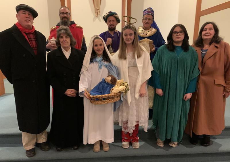 This year's program participants were from left, front row: Ed LeCuyer, musical director; Christine Splaine, reader; Madaline Bilodeau, Mary; Erin Botts, angel; Cadie Burns, witness; Wilma Tatlock; coordinator. Back row: from left, Henry Hurford, Micheal Bilodeau and John Leonard, the Three Kings. BILL PEARSON/Boothbay Register inside look