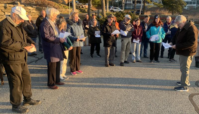 Boothbay Baptist Church pastor Glen Carter led the Sunrise Easter service with a crowd of over two dozen participants. BILL PEARSON/Boothbay Register Bayville crowd