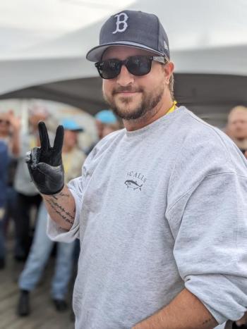 Portland’s Chad Egeland wins the Pemaquid Oyster Festival shucking competition and will advance to the national contest in Maryland. CANDI JONETH/Boothbay Register