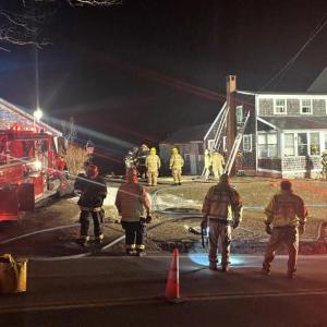 Firefighters at the scene of a fire at 225 Ocean Point Road, East Boothbay Sunday, Feb. 20. SARAH MORLEY/Boothbay Register