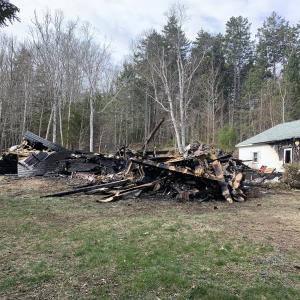 A fire at Christine Sproul’s home at 40 Sproul Lane, Boothbay on Friday reignited early Saturday morning and destroyed the house. KEVIN BURNHAM/Boothbay Register