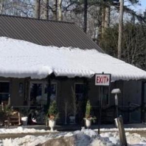 A Dec. 15 car accident resulted in damage to the Cook’s Landing sign on Route 27 in Edgecomb. BILL PEARSON/Boothbay Register