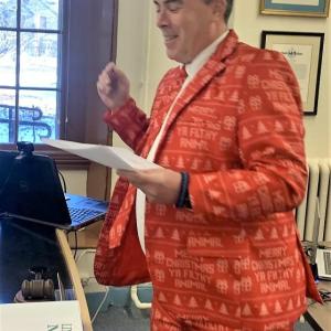 Chief Deputy Rand Maker was in the Christmas spirit Dec. 20 as he presented the sheriff’s department report during the county commissioners meeting. BILL PEARSON/Boothbay Register