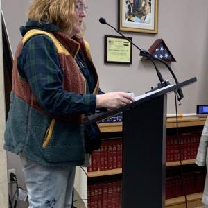 Boothbay Harbor resident Kate Sullivan urges selectmen Feb. 13 to take quick action in filling four of the eight vacancies in the police department. BILL PEARSON/Boothbay Register