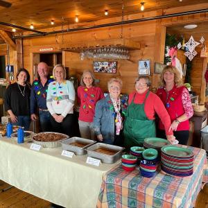 Up for the 2nd year in a row is the Smiling Cow and Log Cabin Shoes! Open Restaurants, Garden’s Aglow